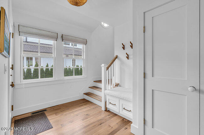 1204 5th Avenue Spring Lake, NJ 07762 - Photo 5 of 36 a view of an entryway with staircase