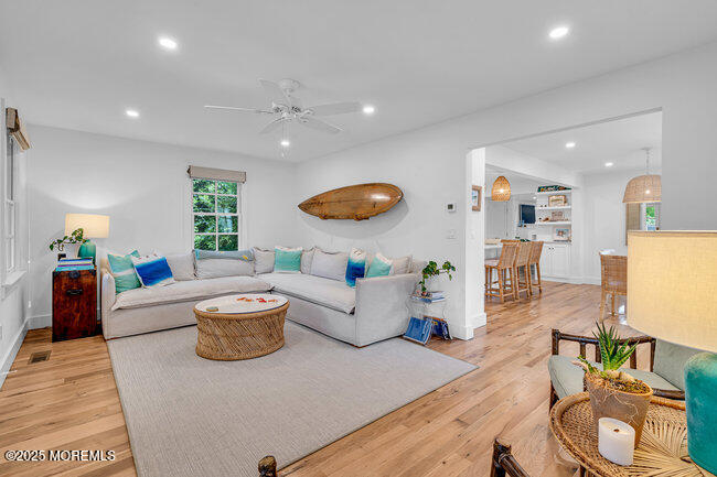 1204 5th Avenue Spring Lake, NJ 07762 - Photo 6 of 36 a living room with furniture and wooden floor