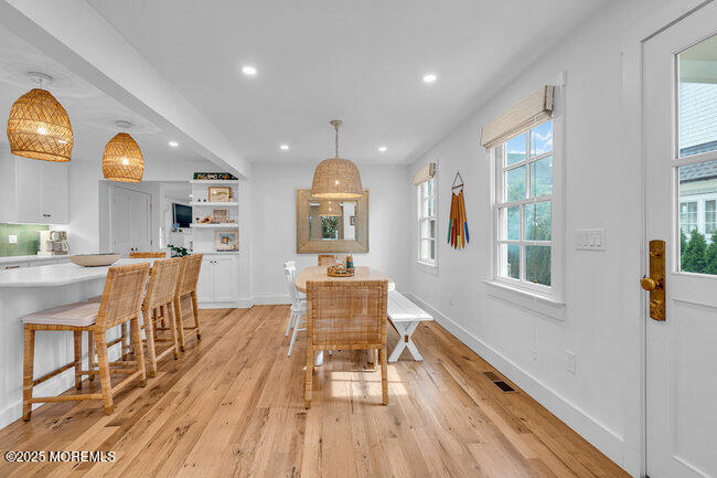 1204 5th Avenue Spring Lake, NJ 07762 - Photo 10 of 36 a living room with furniture and a wooden floor