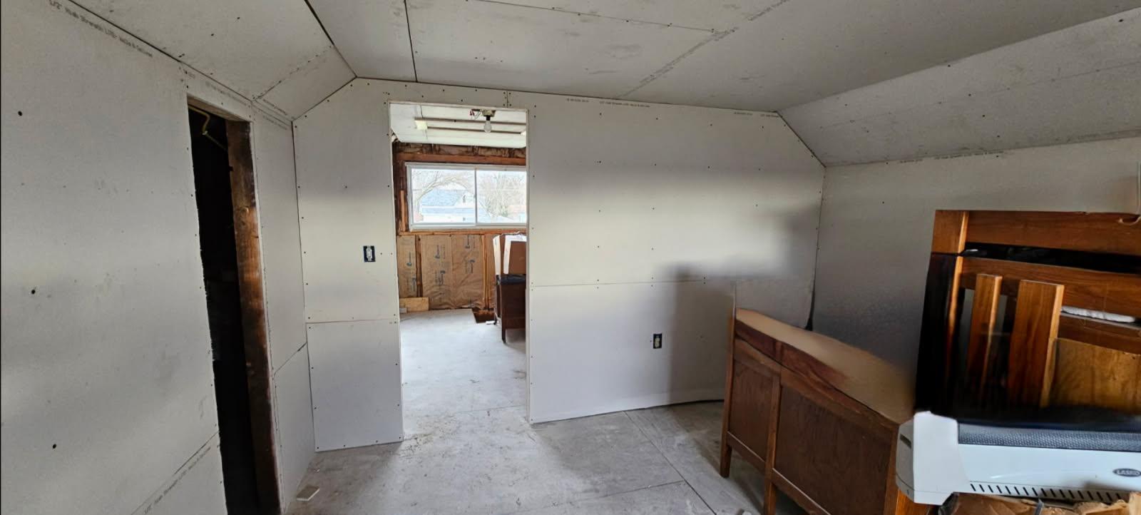 113 Cunningham Avenue Danville, IL 61832 - Photo 24 of 25 a view of a hallway with wooden floor and staircase