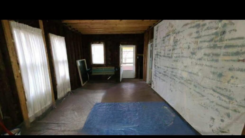 113 Cunningham Avenue Danville, IL 61832 - Photo 6 of 25 a view of gallery with wooden floor