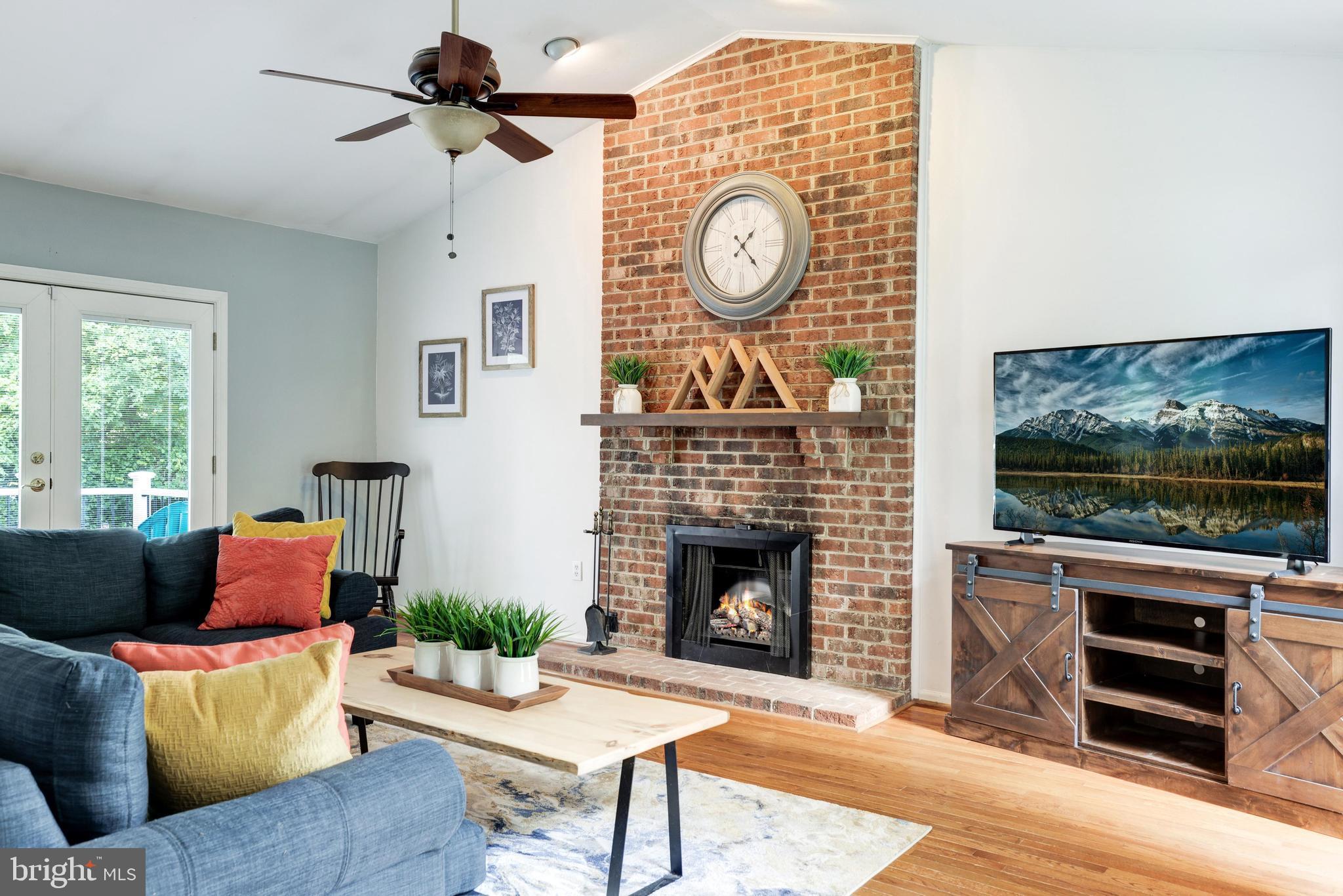 210 Environs Road Sterling, VA 20165 - Photo 20 of 57 Family room with cozy fireplace