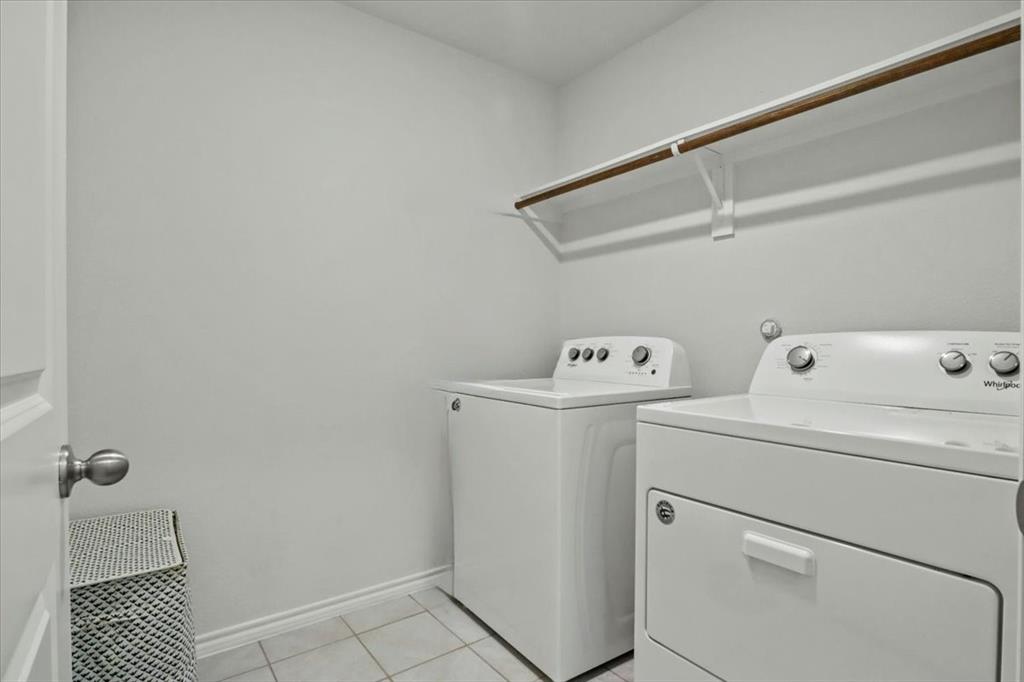 804 Roland Drive Fate, TX 75189 - Photo 18 of 27 a utility room with dryer and washer