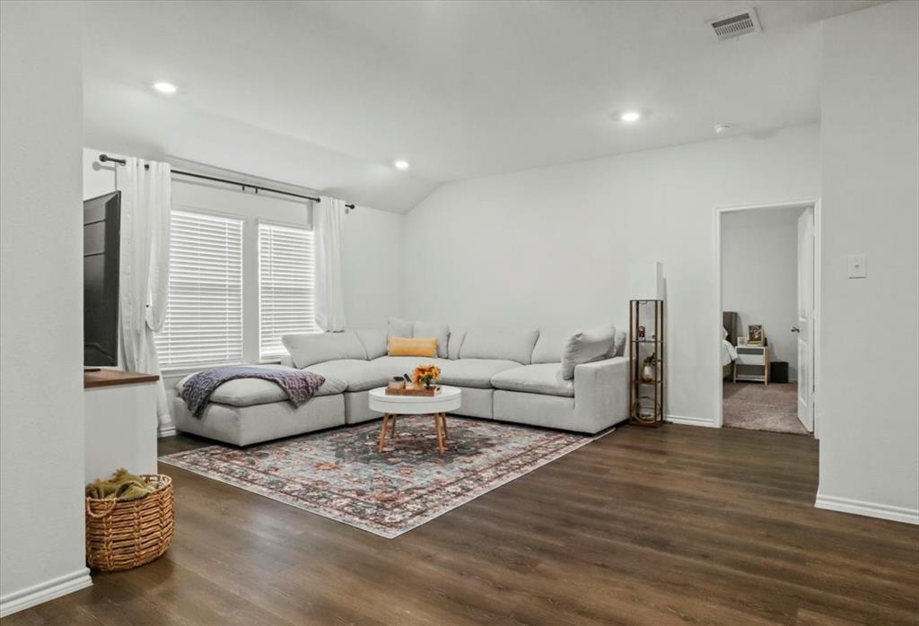804 Roland Drive Fate, TX 75189 - Photo 5 of 27 a living room with furniture and a large window