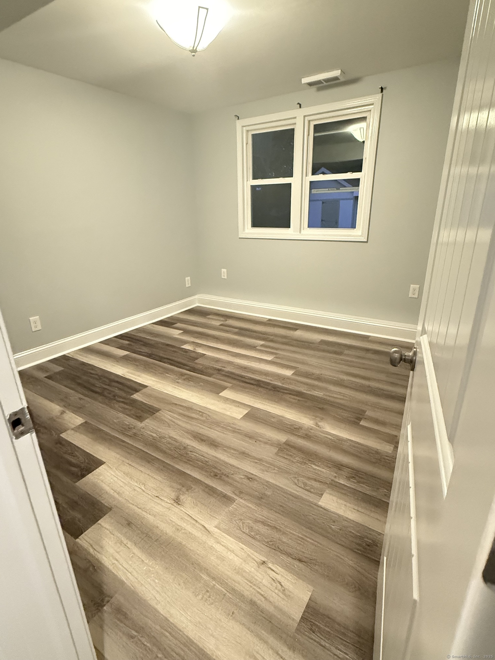 65 Muir Terrace, Unit 1 Southington, CT 06489 - Photo 19 of 24 a view of a room with an empty room