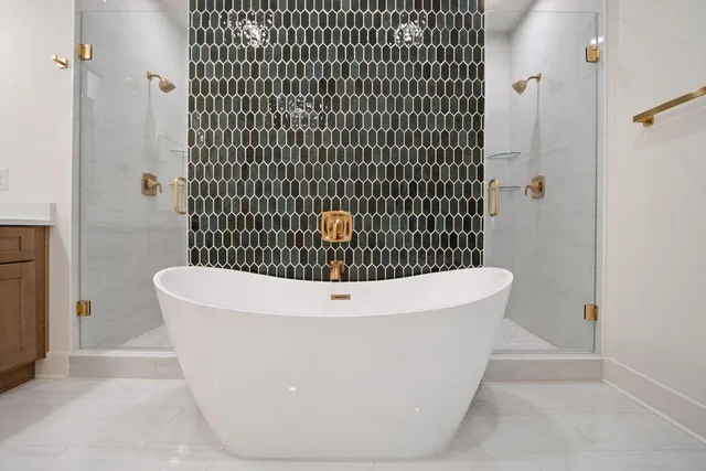 a white bath tub sitting in a bathroom