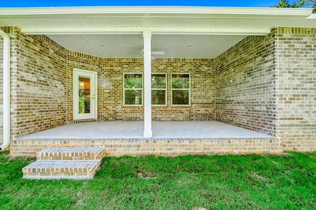 a view of a house with a big yard