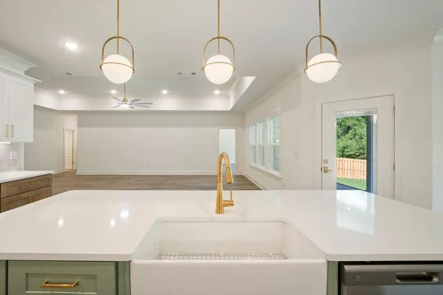 a view of a swimming pool and a chandelier