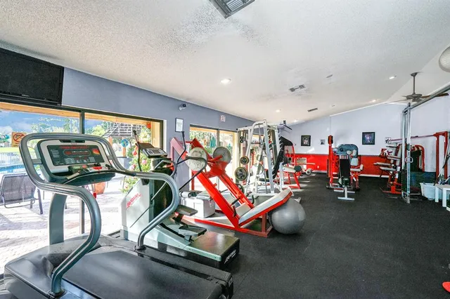 a view of a room with gym equipment