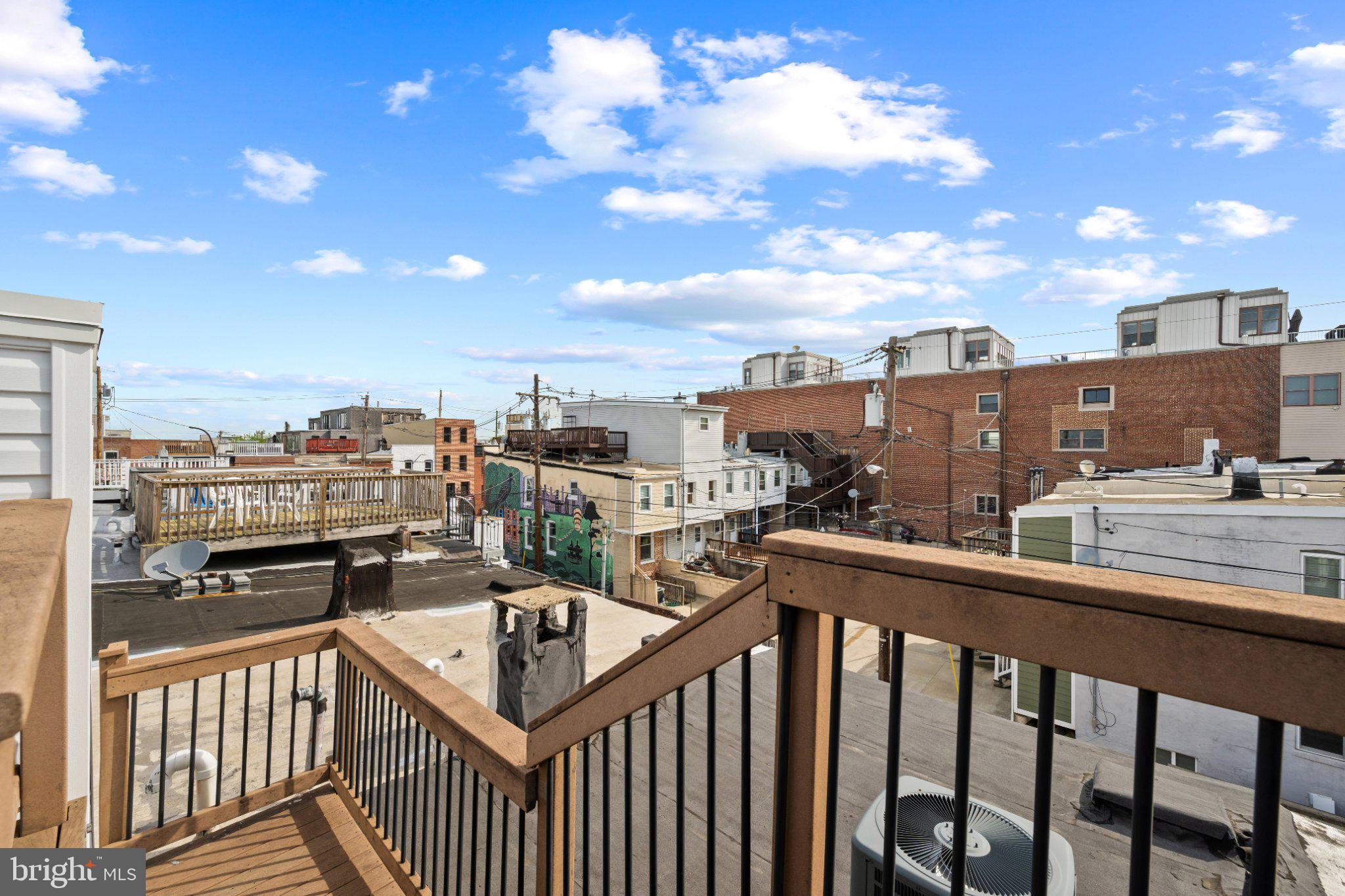 615 South Clinton Street Baltimore, MD 21224 - Photo 34 of 39 a view of a balcony with city view