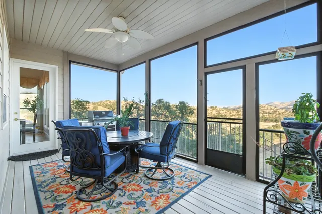 a view of front door with wooden floor