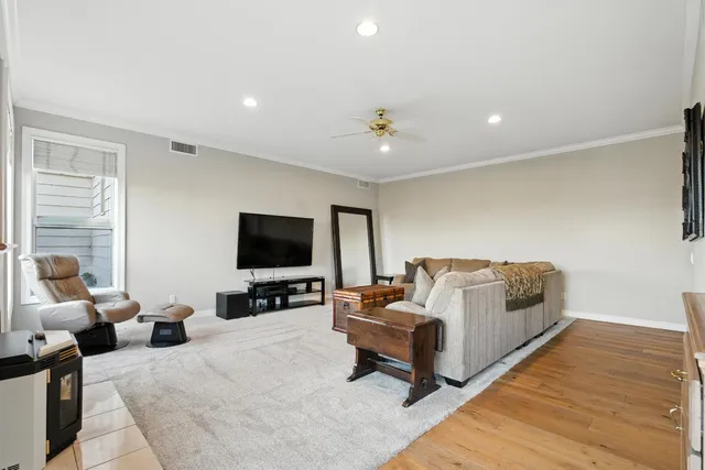a outdoor living space with patio furniture and a potted plant