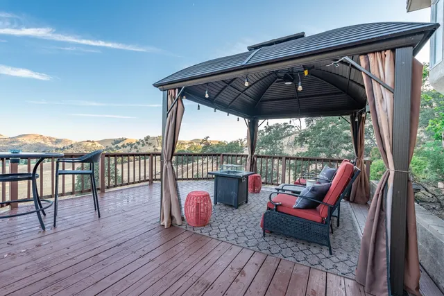 a view of house with outdoor seating space