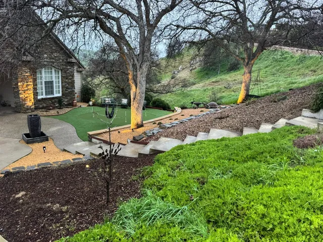 a backyard of a house with lots of green space