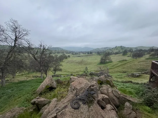 a view of a city with mountains in the background