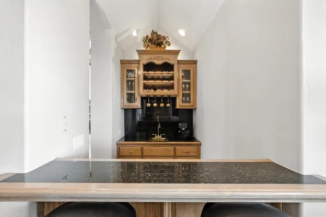 a view of staircase with white walls