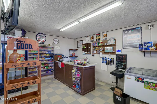 a view of a workspace with furniture