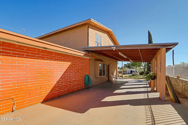 a view of a park with large trees