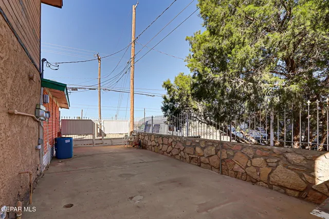 a sign board on the side of a street