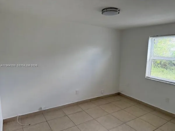an empty room with a window
