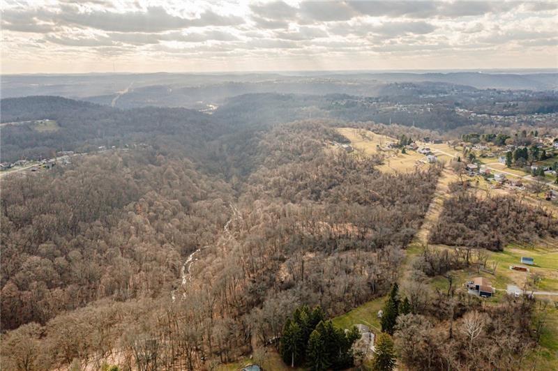 0 Ridge Road Irwin, PA 15642 - Photo 15 of 22 a view of a dry yard with wooden floor and fence