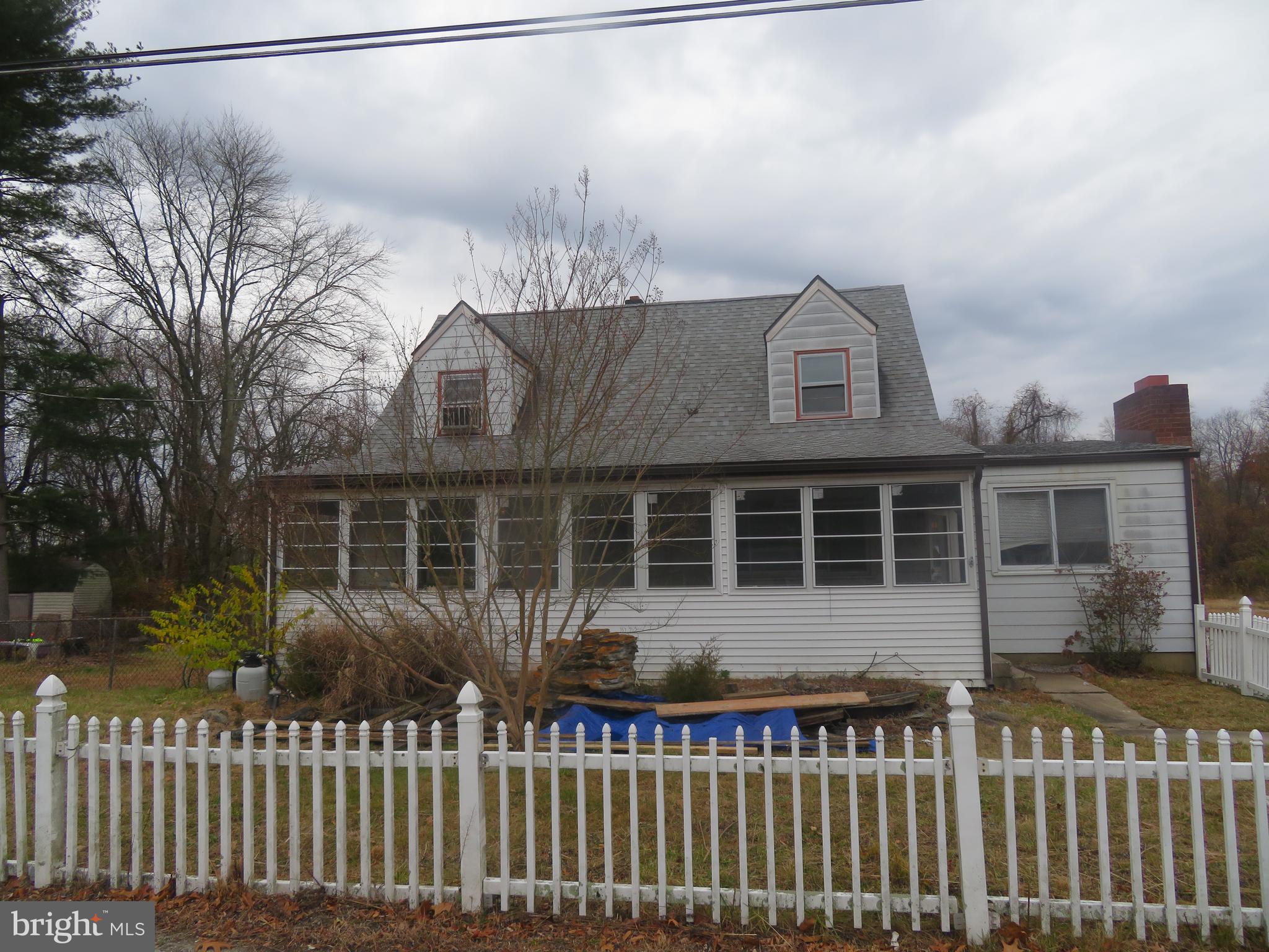 721 Lucas Lane Southampton, NJ 08088 - Photo 1 of 19 a front view of a house with a garden