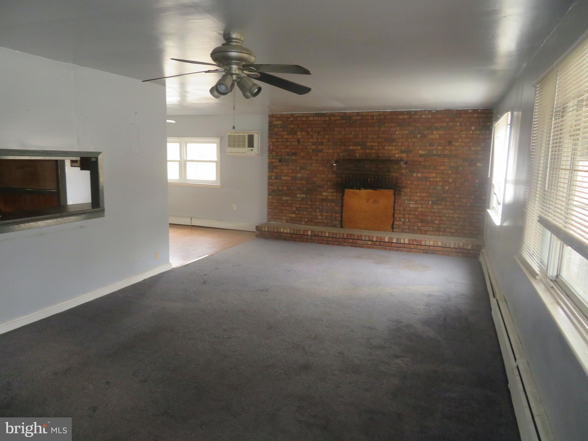 721 Lucas Lane Southampton, NJ 08088 - Photo 7 of 19 a view of a livingroom with a fireplace