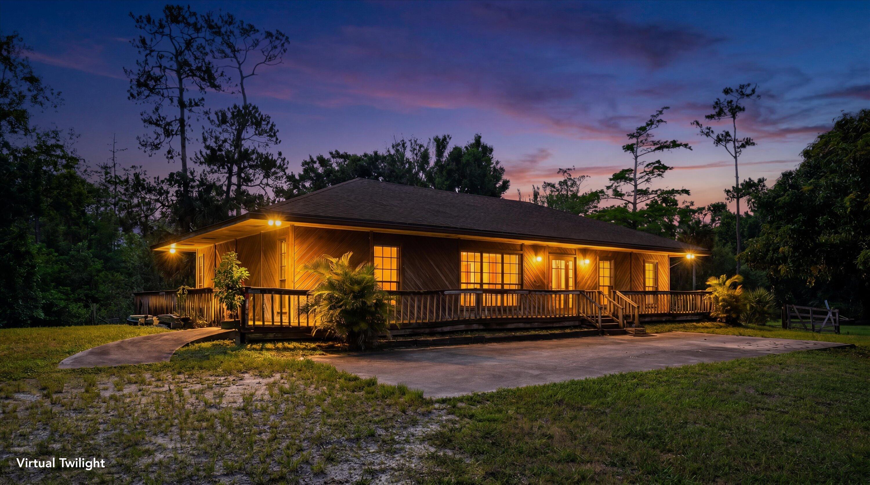 1814 A Road Loxahatchee Groves, FL 33470 - Photo 6 of 38 Twilight front of home