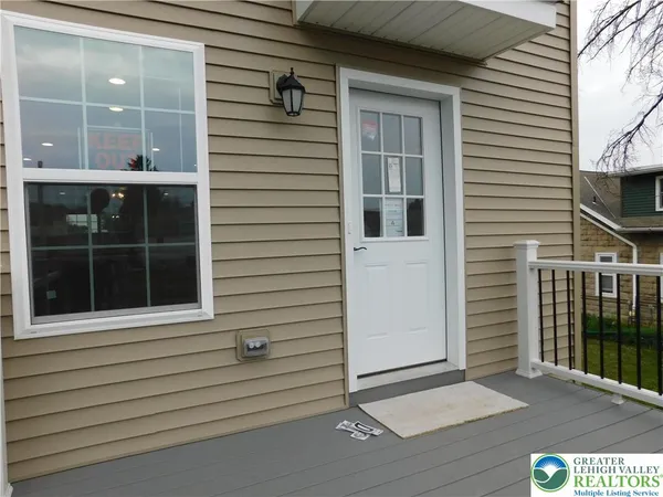 a view of front door and porch