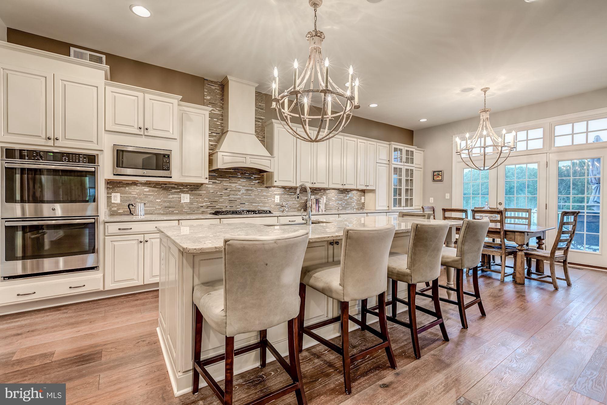 18638 Wild Raspberry Drive Purcellville, VA 20132 - Photo 15 of 49 Kitchen Opens to Trex Deck