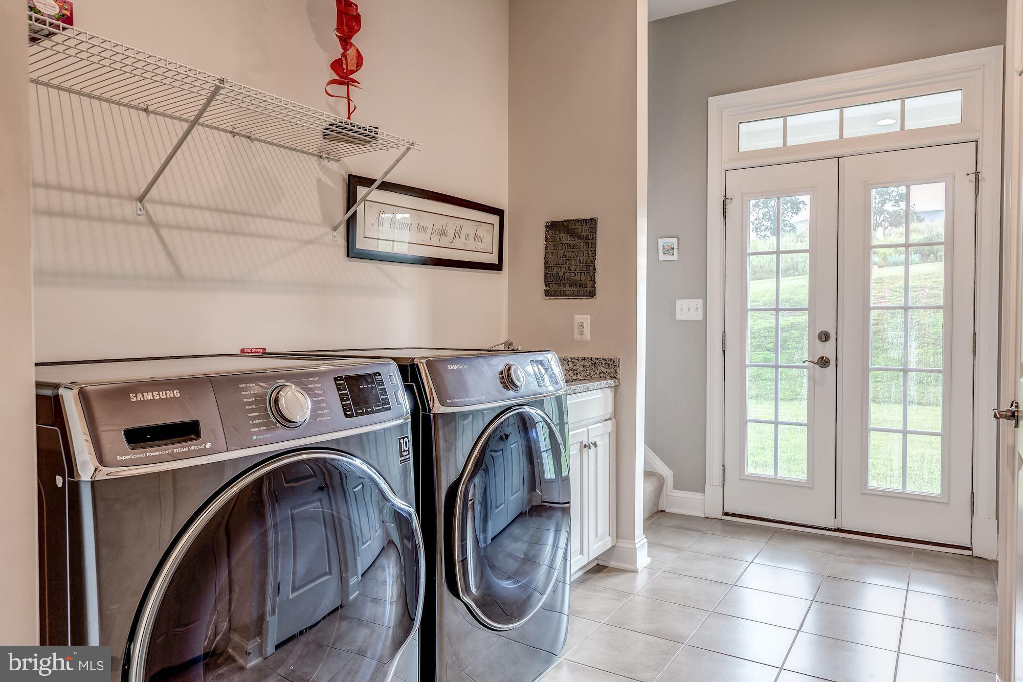 18638 Wild Raspberry Drive Purcellville, VA 20132 - Photo 22 of 49 Utility Room w/ Granite Sink and Second Entrance