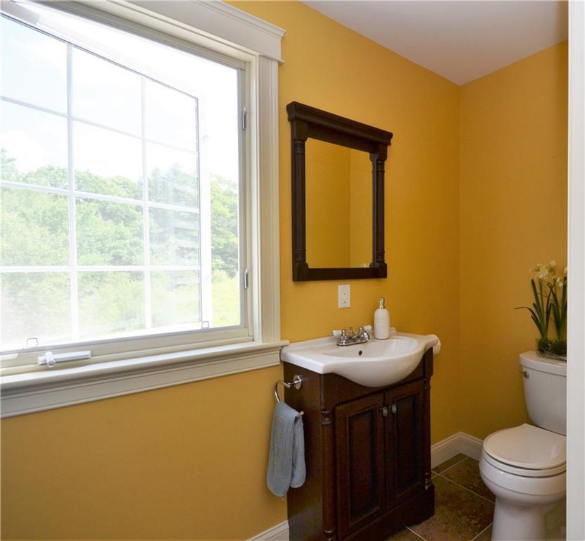 218 County Road Gorham, ME 04038 - Photo 7 of 19 Tiled powder room features stylish...