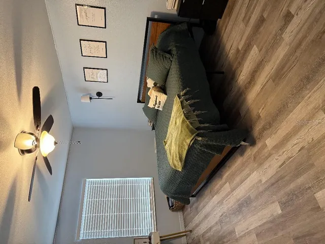 a kitchen with kitchen island a sink and a stove
