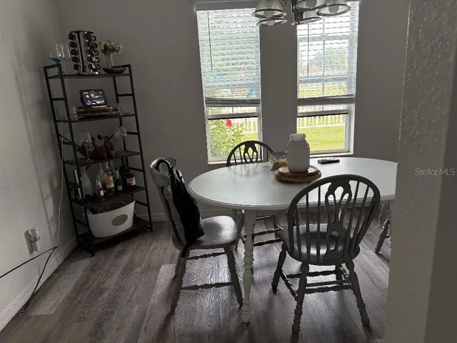 a view of living room with furniture and flat screen tv