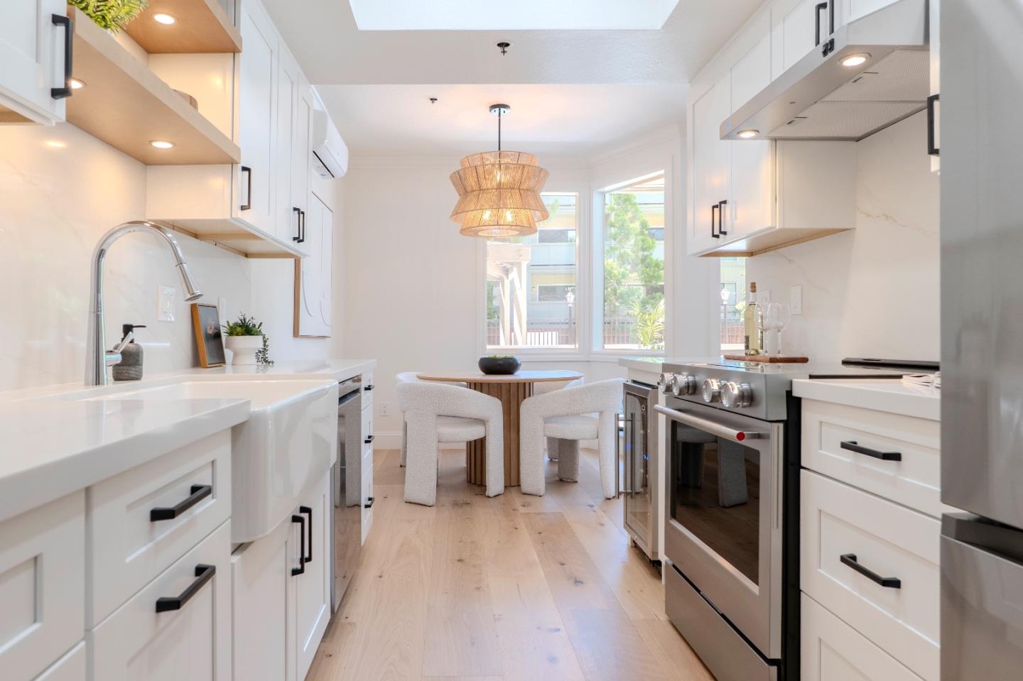 22330 Homestead Road, Unit 116 Cupertino, CA 95014 - Photo 7 of 30 a kitchen with stove a sink and refrigerator