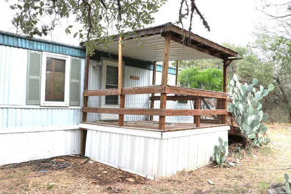 a front view of a house with a porch