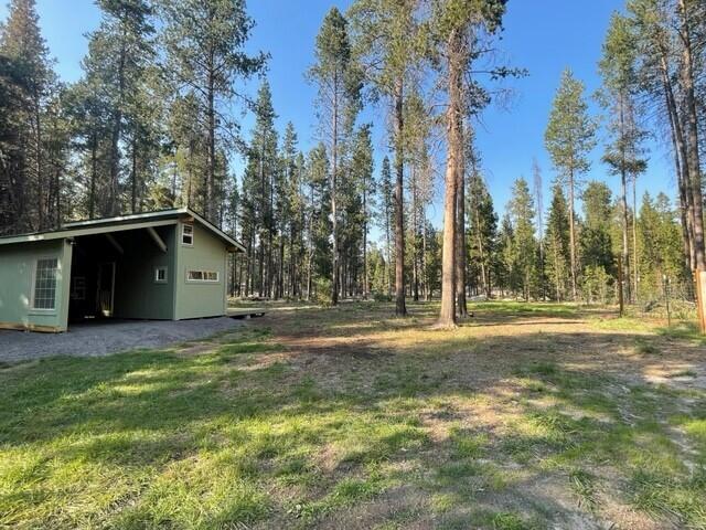 16868 Hermosa Road Bend, OR 97707 - Photo 14 of 40 a view of a house with a yard