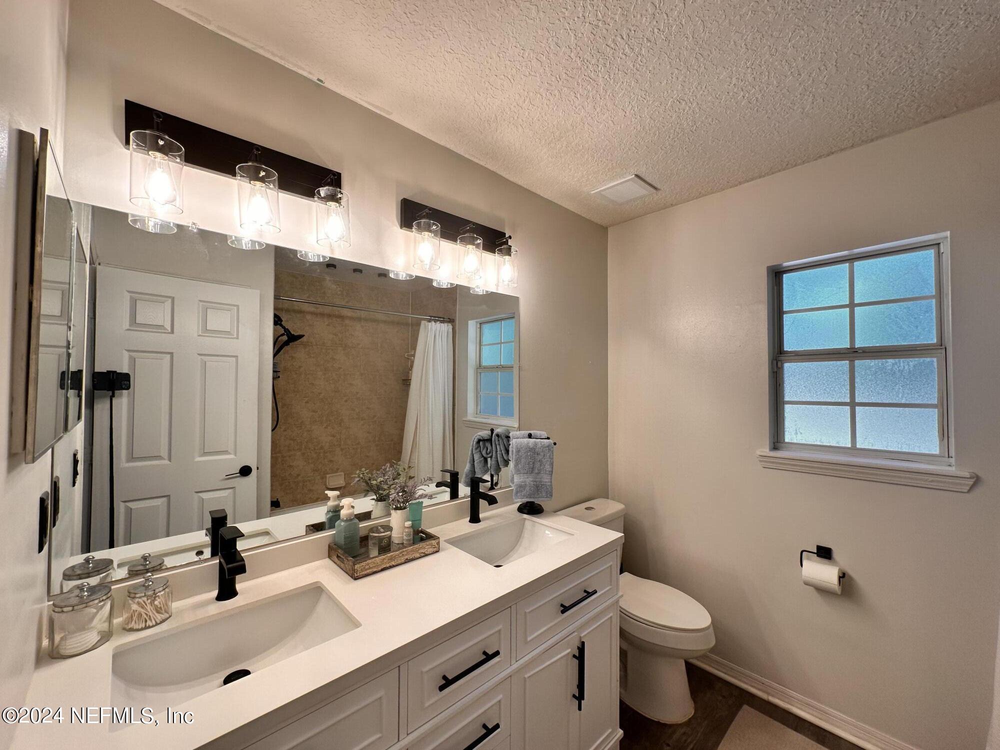 8565 Metto Road Jacksonville, FL 32244 - Photo 8 of 16 Primary bathroom