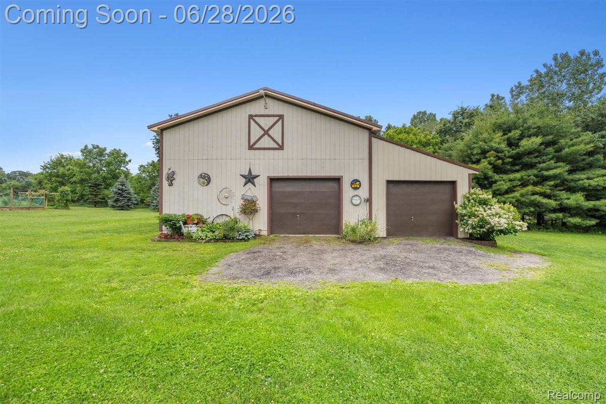 125 Olde Franklin Road Howell, MI 48855 - Photo 6 of 57 Concrete floor , generator hook up, 2 horse stalls & hay mow
