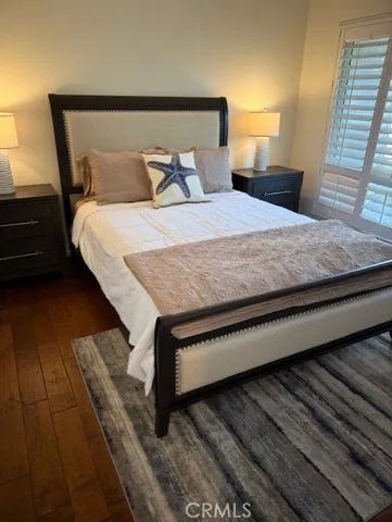 a bathroom with a shower a toilet and a sink