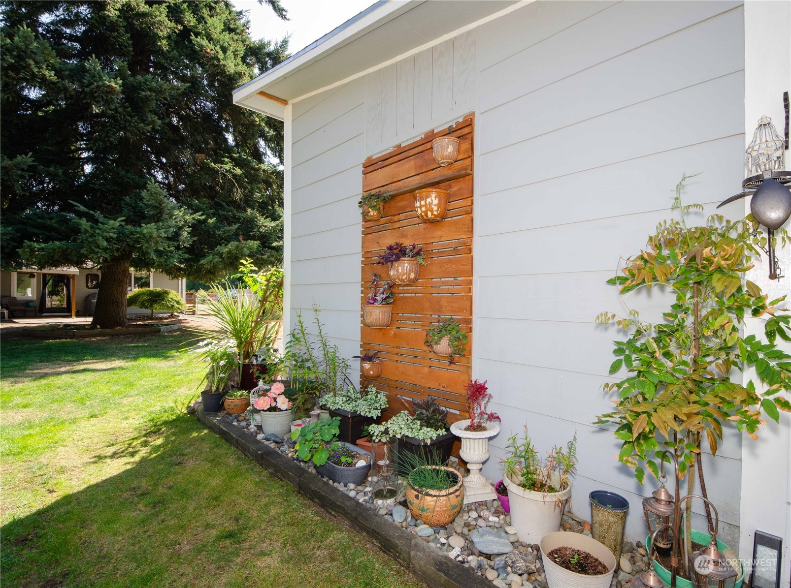 18425 Apricot Street Southwest Rochester, WA 98579 - Photo 18 of 39 a front view of a house having a yard
