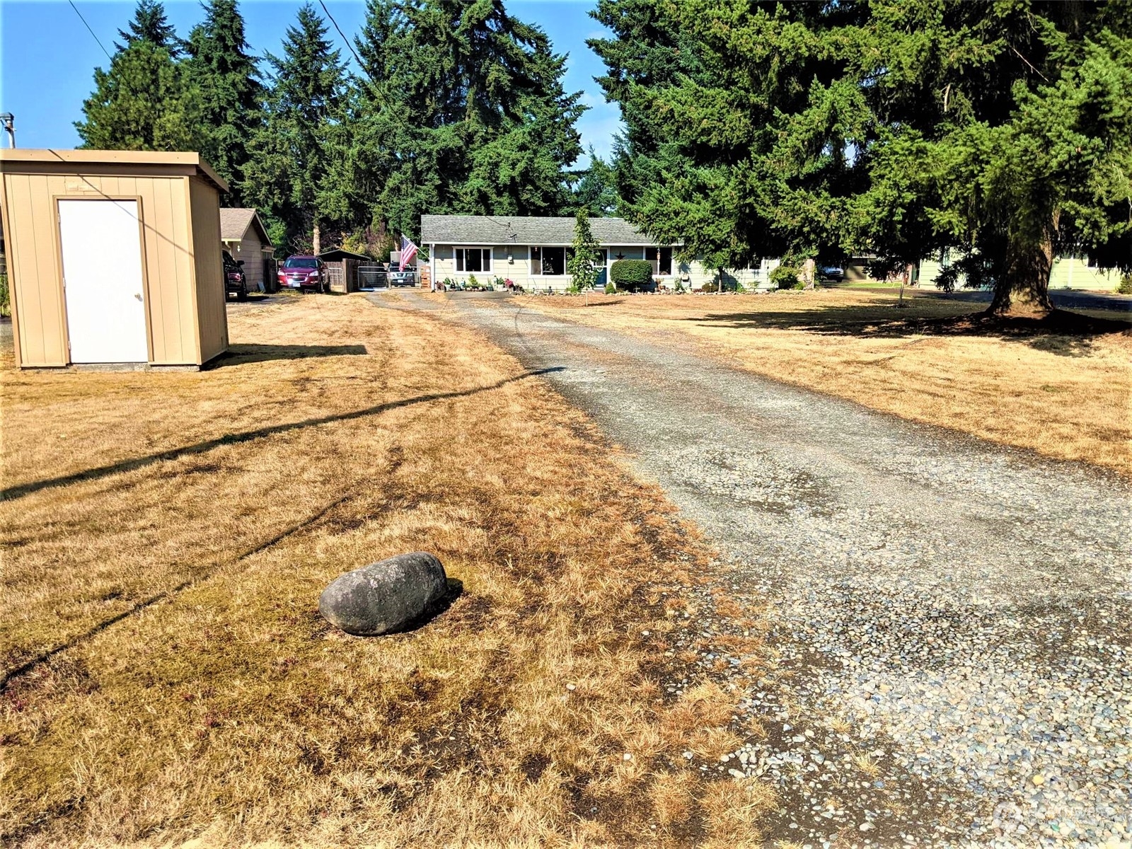 18425 Apricot Street Southwest Rochester, WA 98579 - Photo 36 of 39 a view of a yard with basketball court
