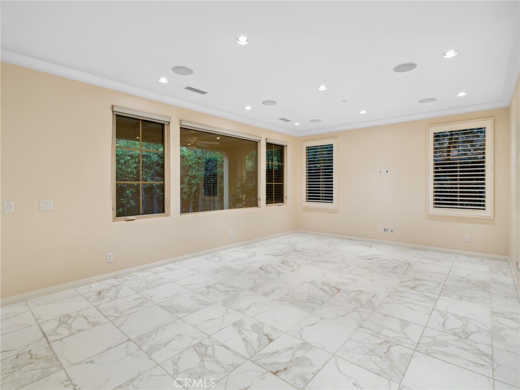 58 Lupari Irvine, CA 92618 - Photo 11 of 60 a view of an empty room with a window