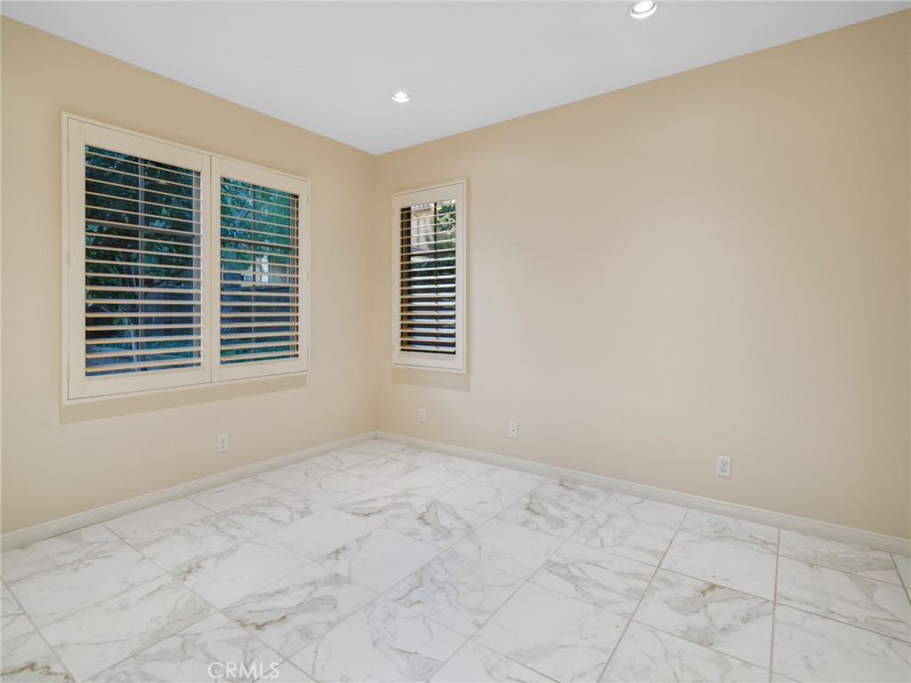 58 Lupari Irvine, CA 92618 - Photo 15 of 60 a view of an empty room with a window