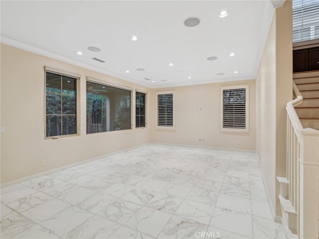 58 Lupari Irvine, CA 92618 - Photo 17 of 60 a view of an empty room with windows