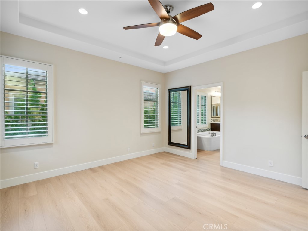58 Lupari Irvine, CA 92618 - Photo 20 of 60 a view of an empty room with window and a kitchen