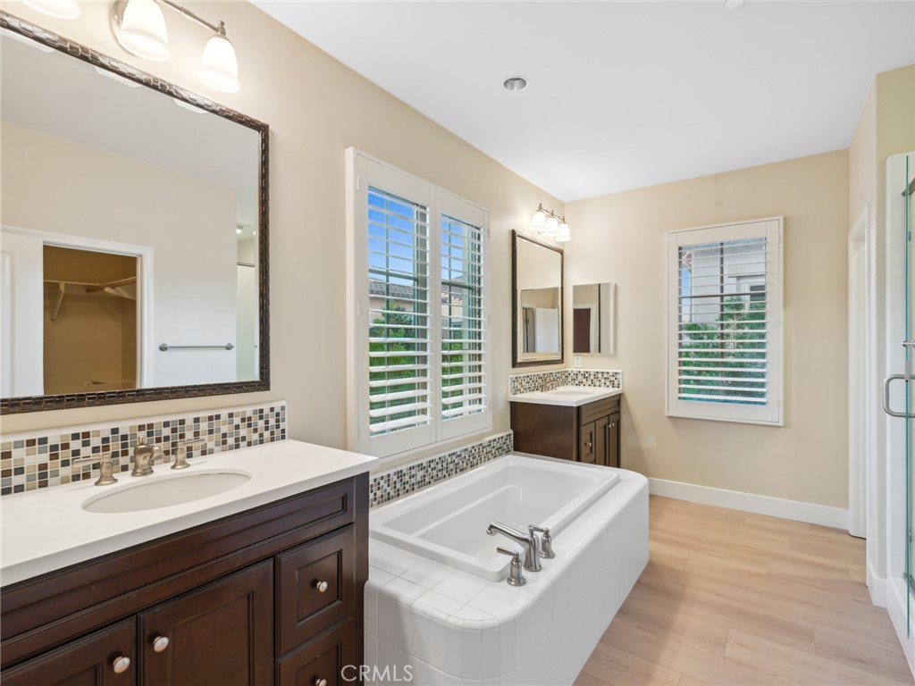 58 Lupari Irvine, CA 92618 - Photo 21 of 60 a bathroom with a sink and a bathtub