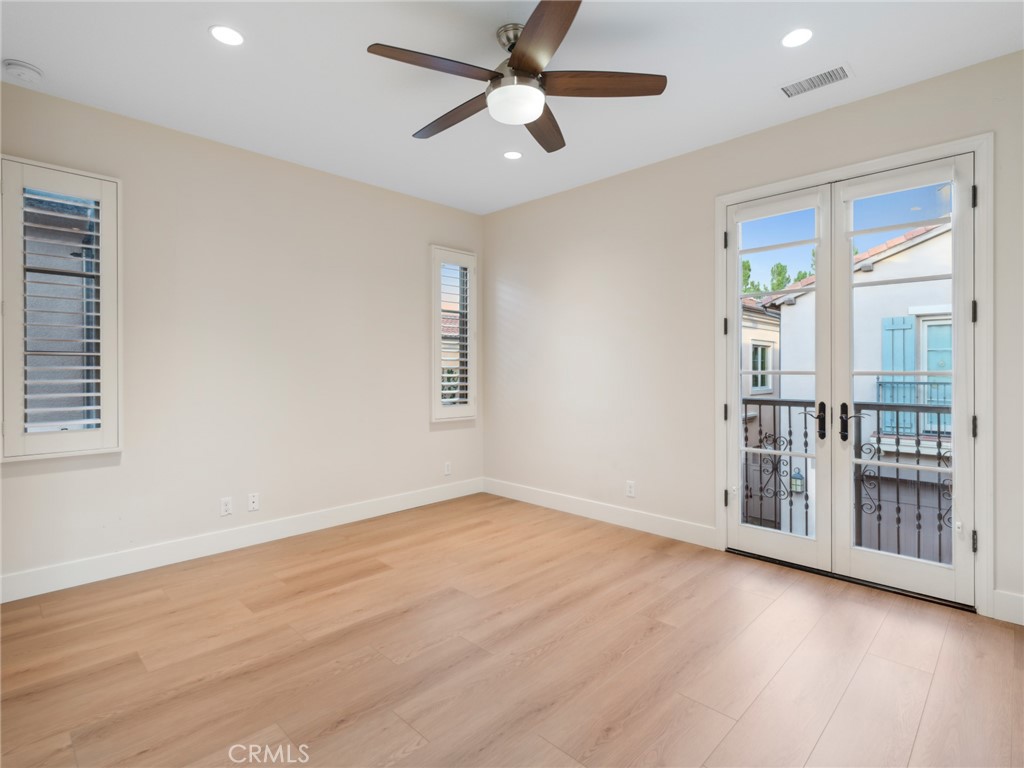 58 Lupari Irvine, CA 92618 - Photo 23 of 60 wooden floor in an empty room with a window