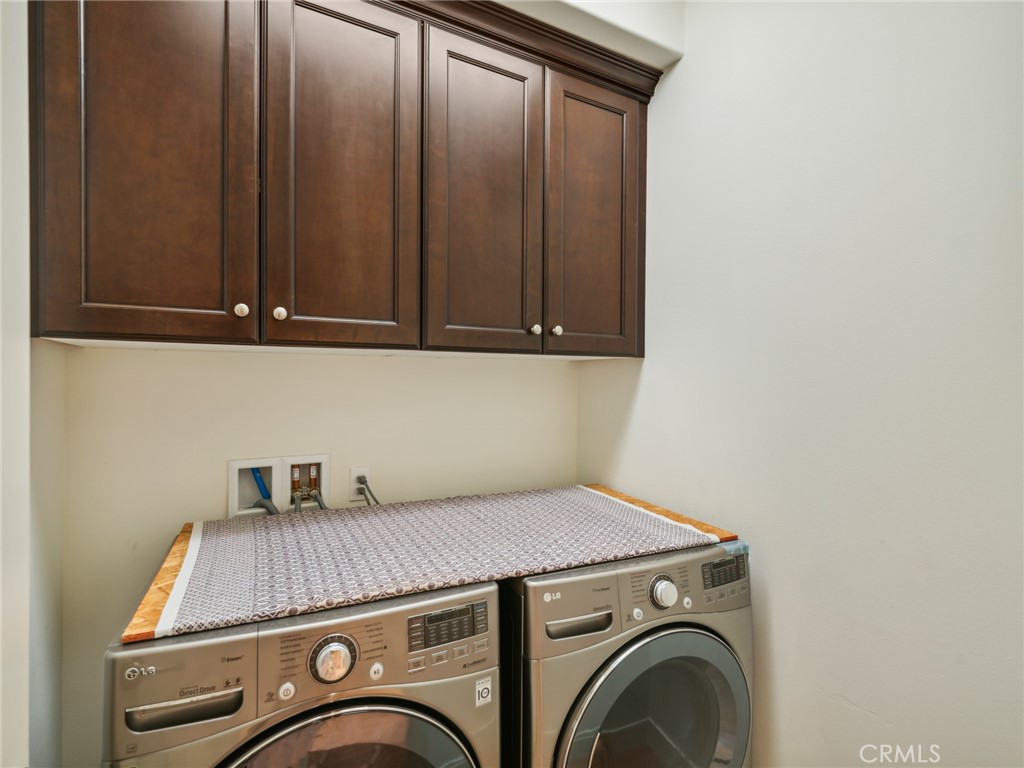 58 Lupari Irvine, CA 92618 - Photo 26 of 60 a utility room with dryer and washer