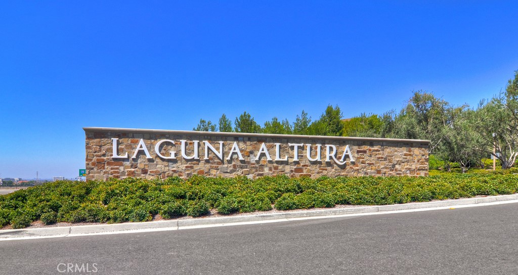 58 Lupari Irvine, CA 92618 - Photo 27 of 60 a street sign that is on a pole